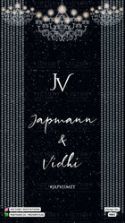 A digital preview of a custom wedding invitation card featuring a dark black background with white text reading 'JV', 'Japmann & Vidhi', and '#JAPVIIMET'. The design is decorated with elegant white chandeliers at the top, vertical dotted columns on the sides, and subtle white star-like speckles throughout.