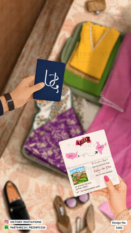 A close-up of hands holding printed invitation cards over a styled flat-lay of colorful stationery accessories on a patterned fabric background. One card is dark blue with white script, and the other is white with pink and multicolor printed details.