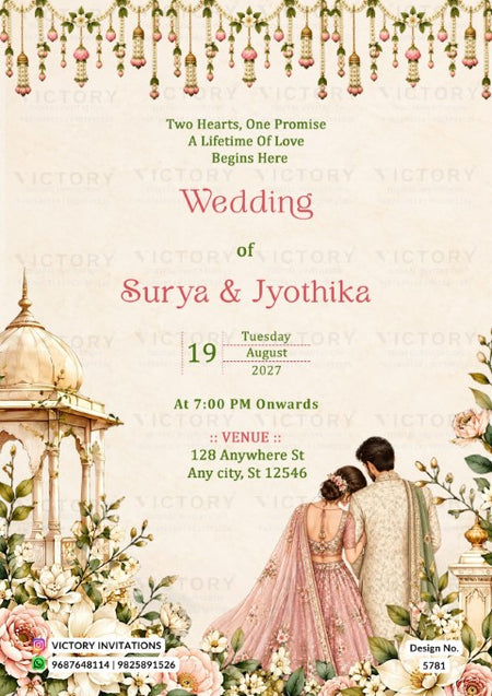 A wedding invitation card featuring an elegant Indian theme with a cream background, pink and red text, hanging floral garlands at the top, a domed temple illustration on the left, and a couple in traditional wedding attire on the bottom right. The brand name 'Victory Invitations' is watermarked across the card.